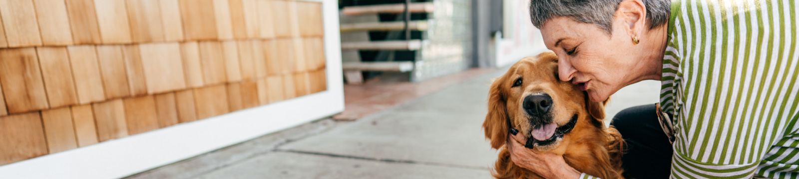 A mature woman with a dog