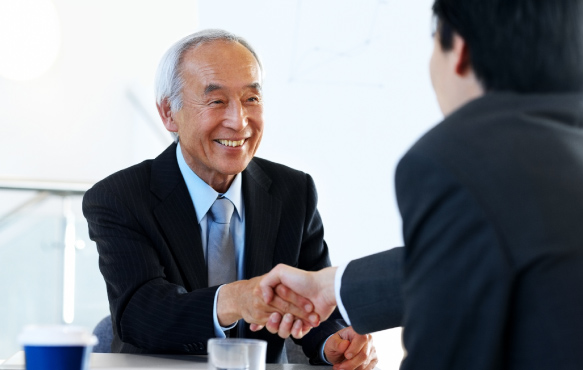 Two businessmen shaking hands